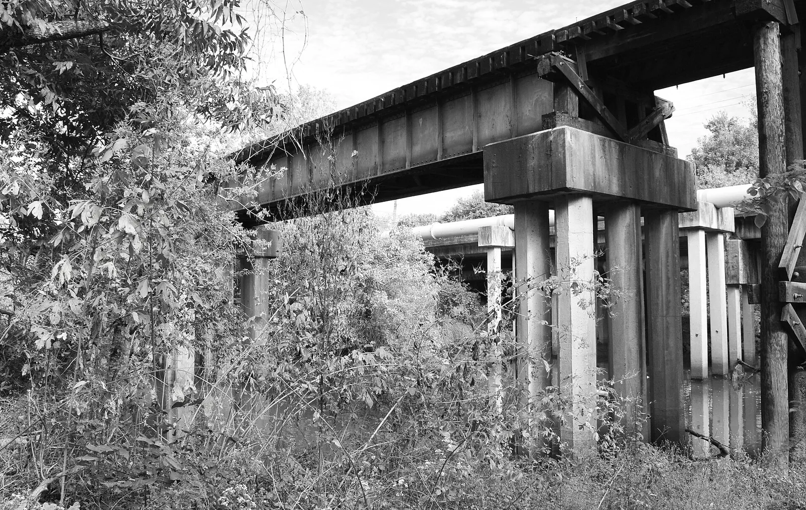 A railroad bridge over the old Sims Bayou channel.