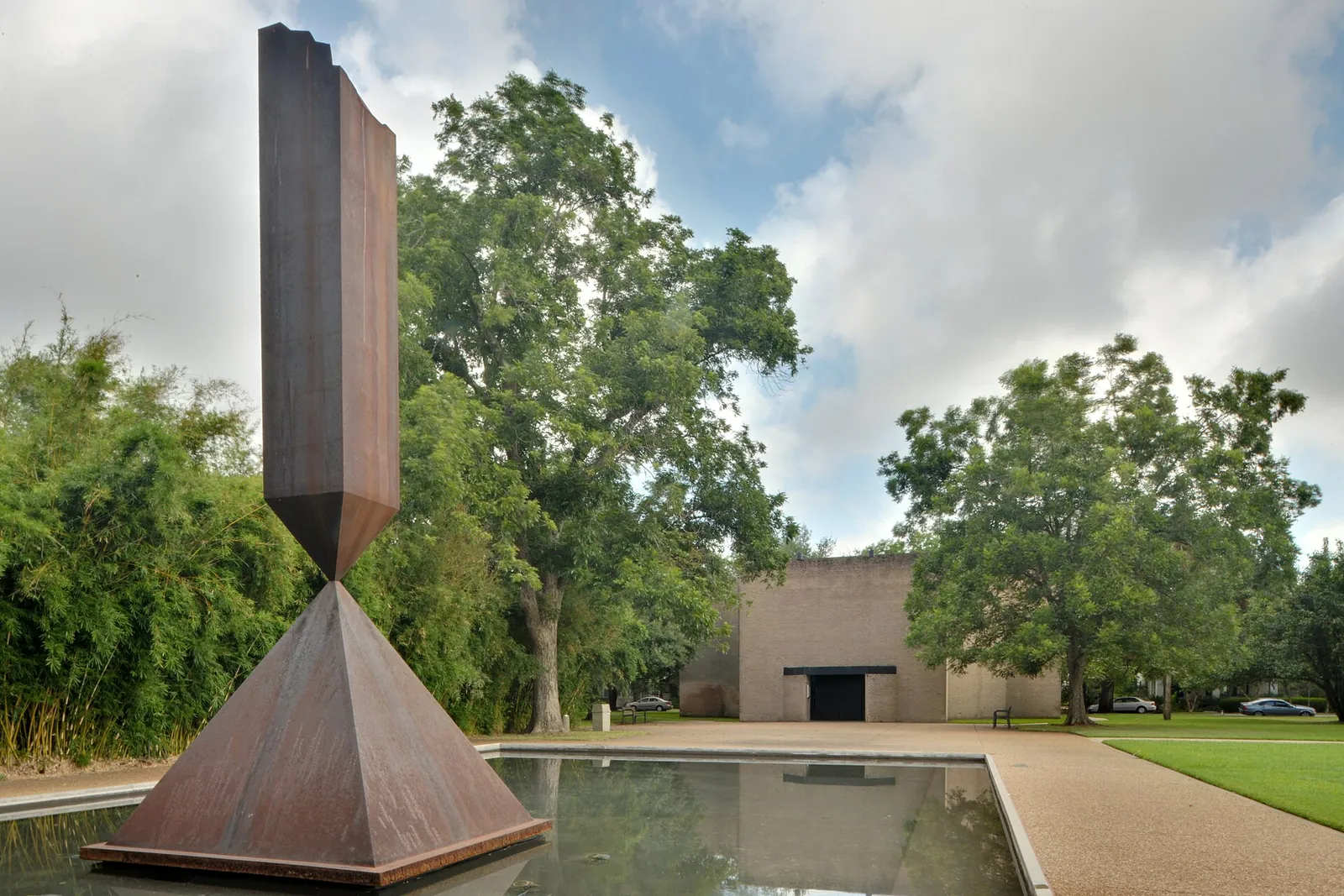 Broken Obelisk sculpture and reflecting pool at the Rothko Chapel.